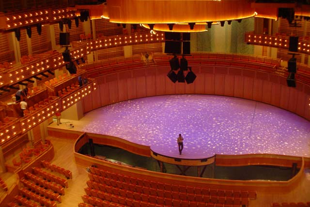  seating around the entire stage which makes it a theatre in the round.
